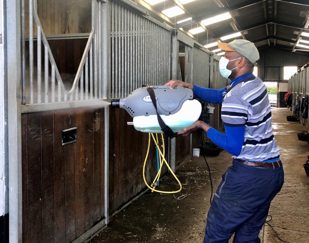 James, working hard to keep a safe and clean environment for staff and horses 