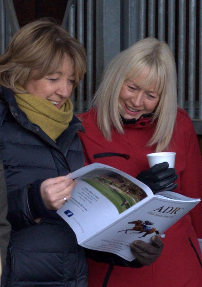 Val & Nancy check out the brochure